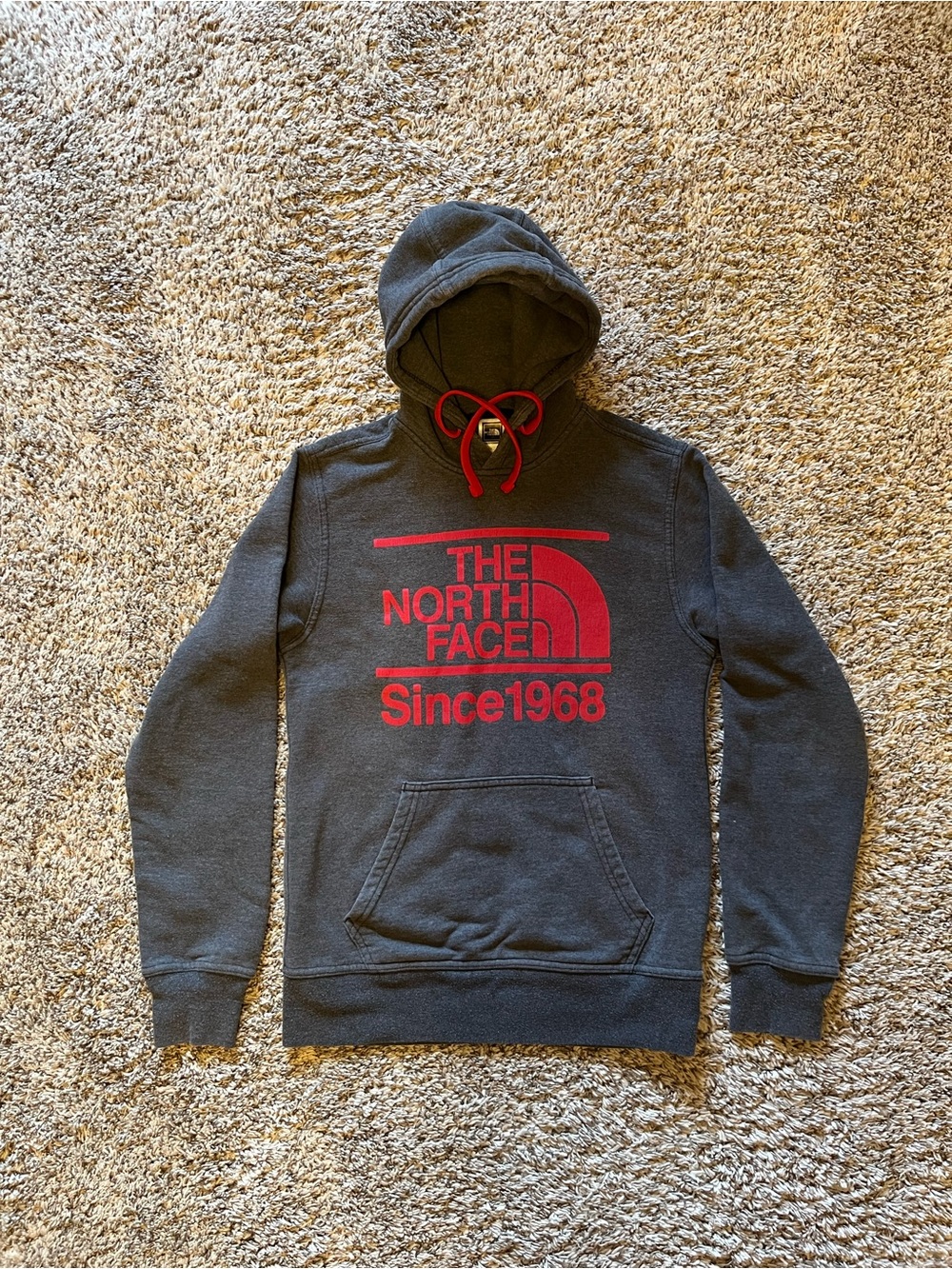 The North Face Men’s Charcoal Hoodie with Red Logo and Red Drawstrings